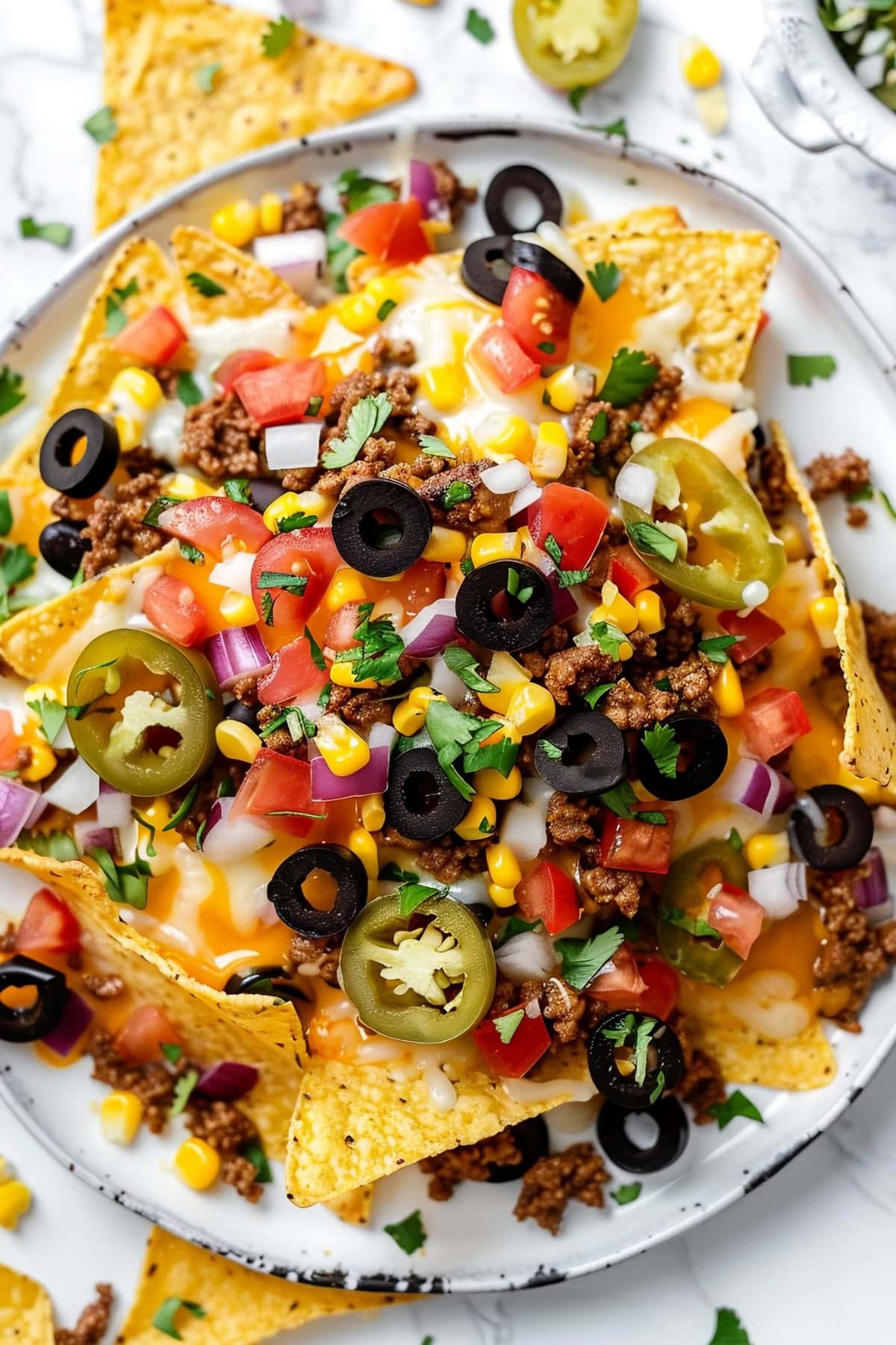 Sheet Pan Nachos in a White Plate, Close-Up