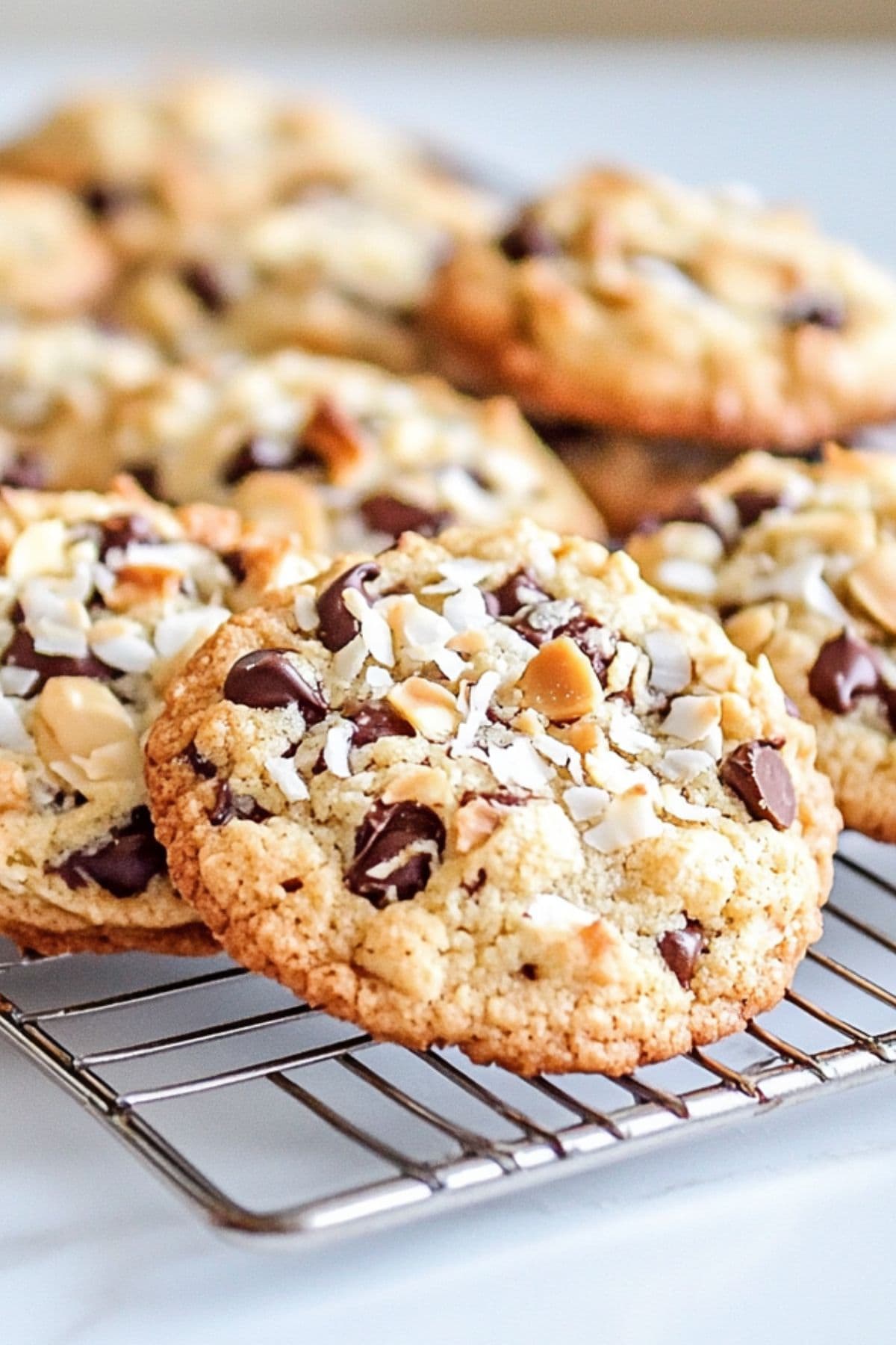 Almond joy cookies in a cooling rack.