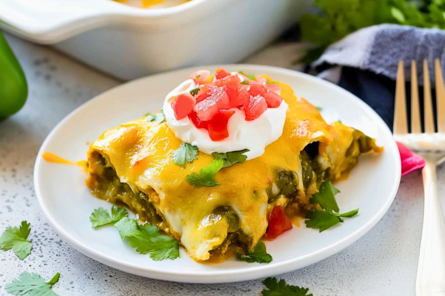 A serving of chile relleno casserole in a white plate.