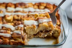 Cinnamon Roll Casserole with white glaze on top,