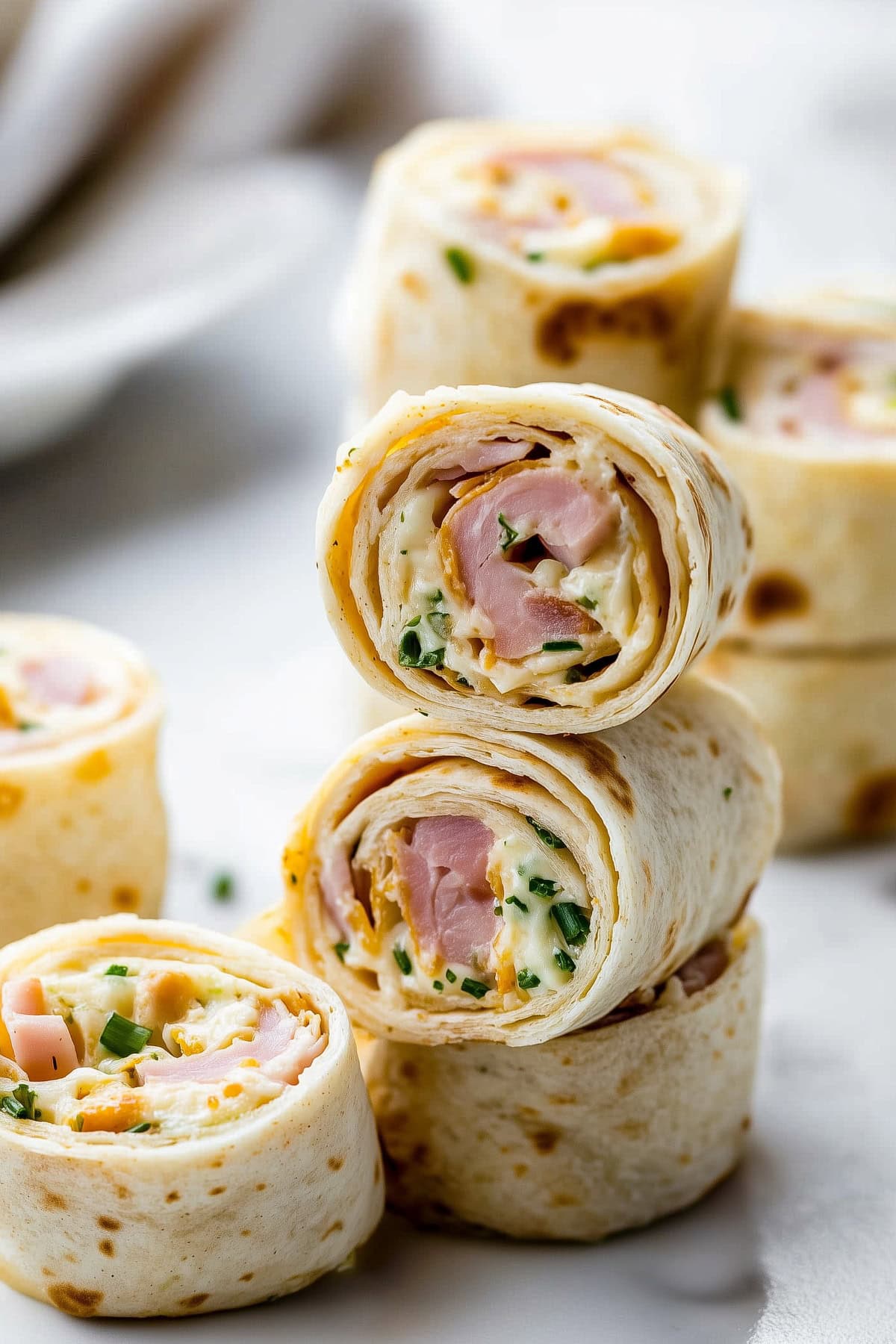 Appetizing homemadee ham and cheese pinwheels.