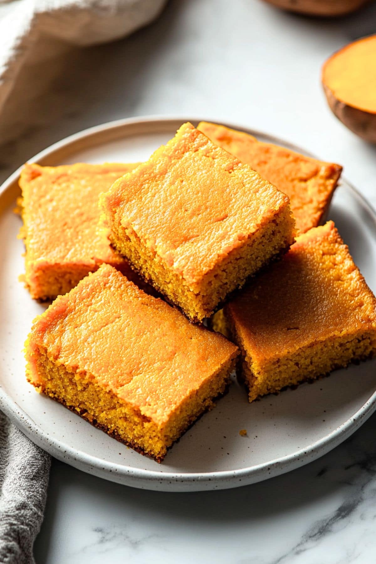 Sweet potato cornbread served on a white plate