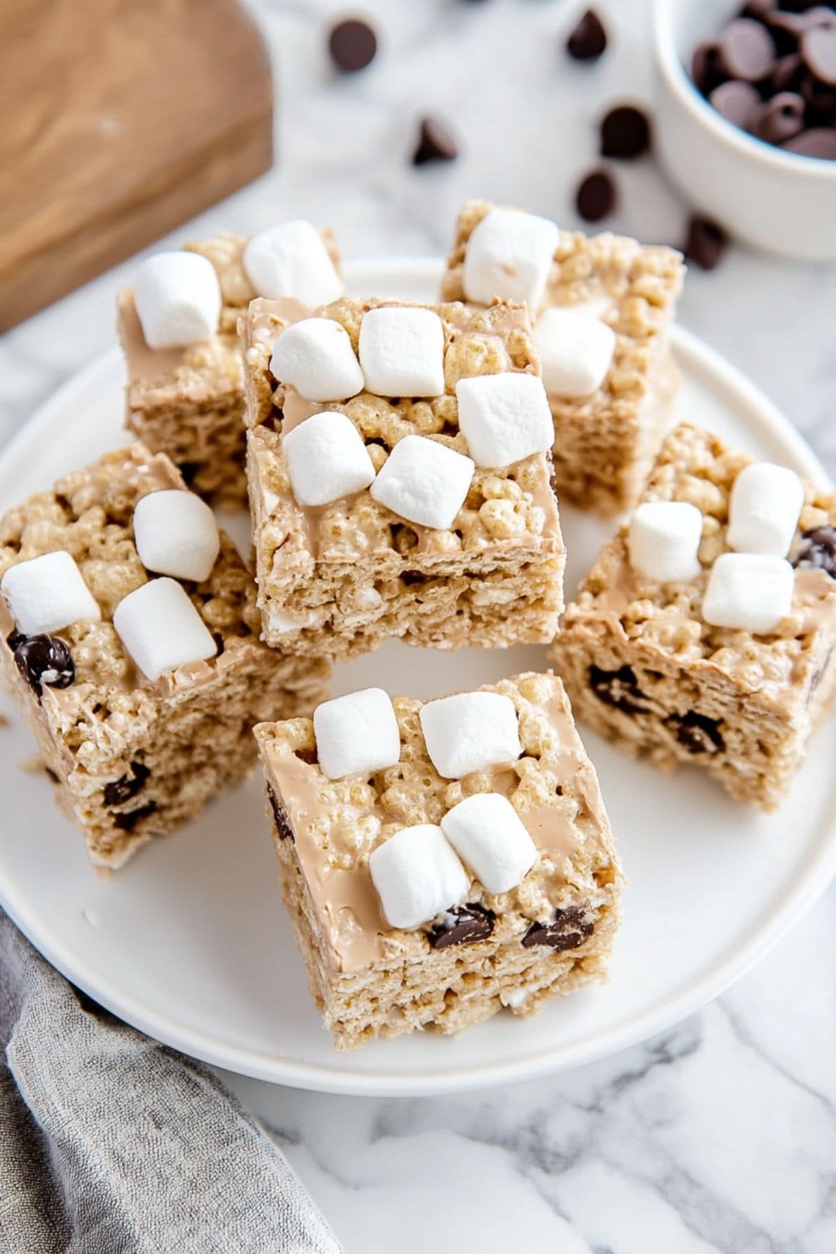 Square slices of avalanche bars on a white plate, top view