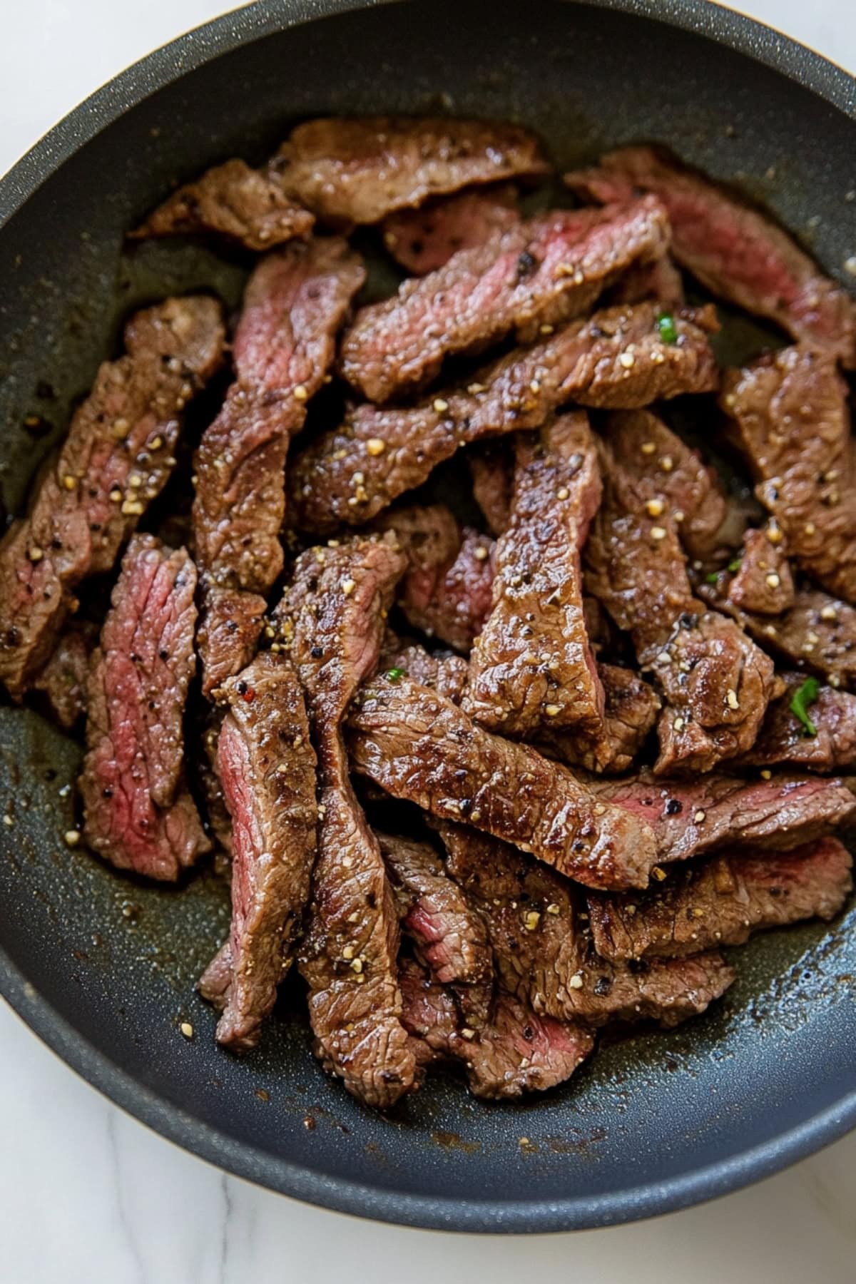 A bowl of flank steaks.