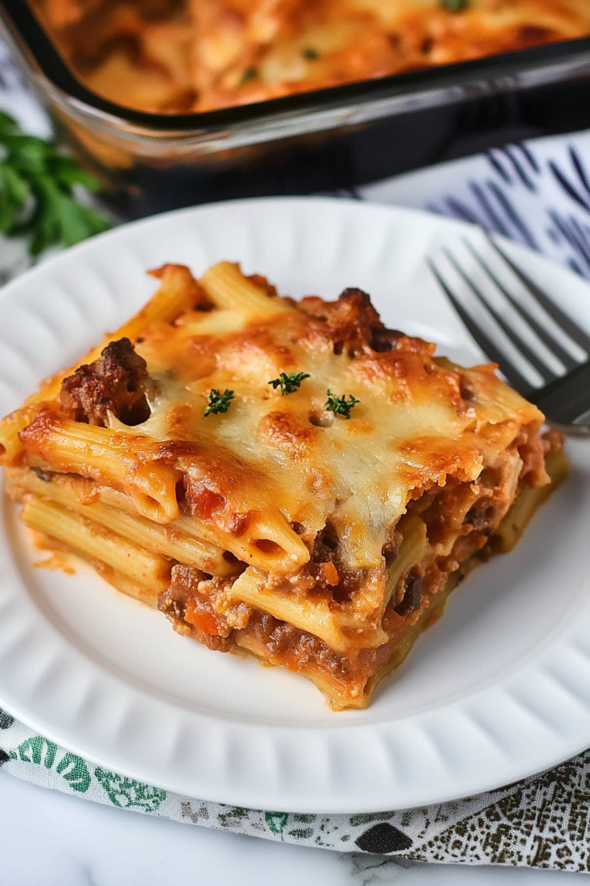 John Marzetti casserole made with penne, ground beef, Italian sausage, cheese and tomato sauce.