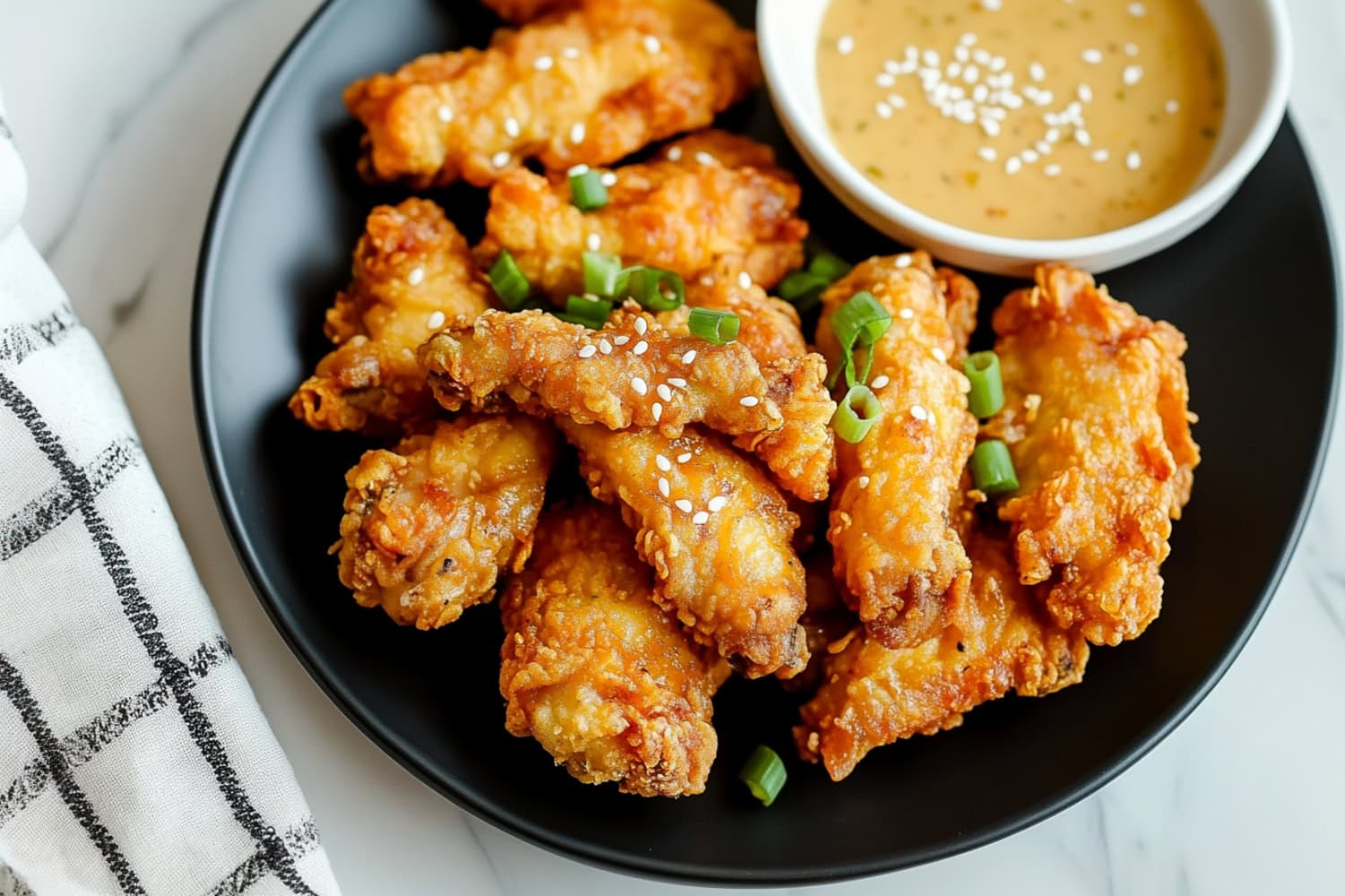 Deep fried Mochiko chicken with honey mustard sauce for dipping.