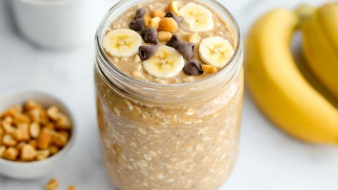 Peanut butter overnight oats served in a glass jar perfect for breakfast.