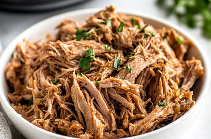 Shredded slow cooked marinated Cuban mojo in a plate.