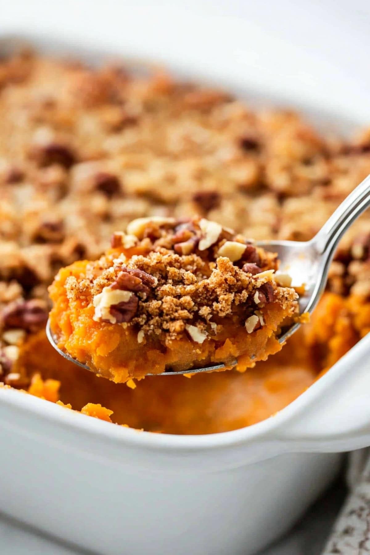 A spoonful of sweet potato soufflé, close-up