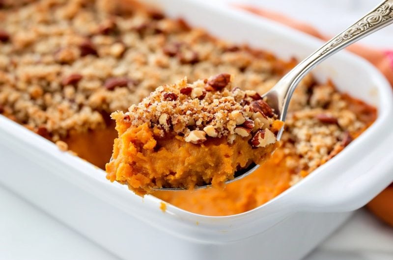 A spoonful of creamy and crunchy sweet potato souffle.