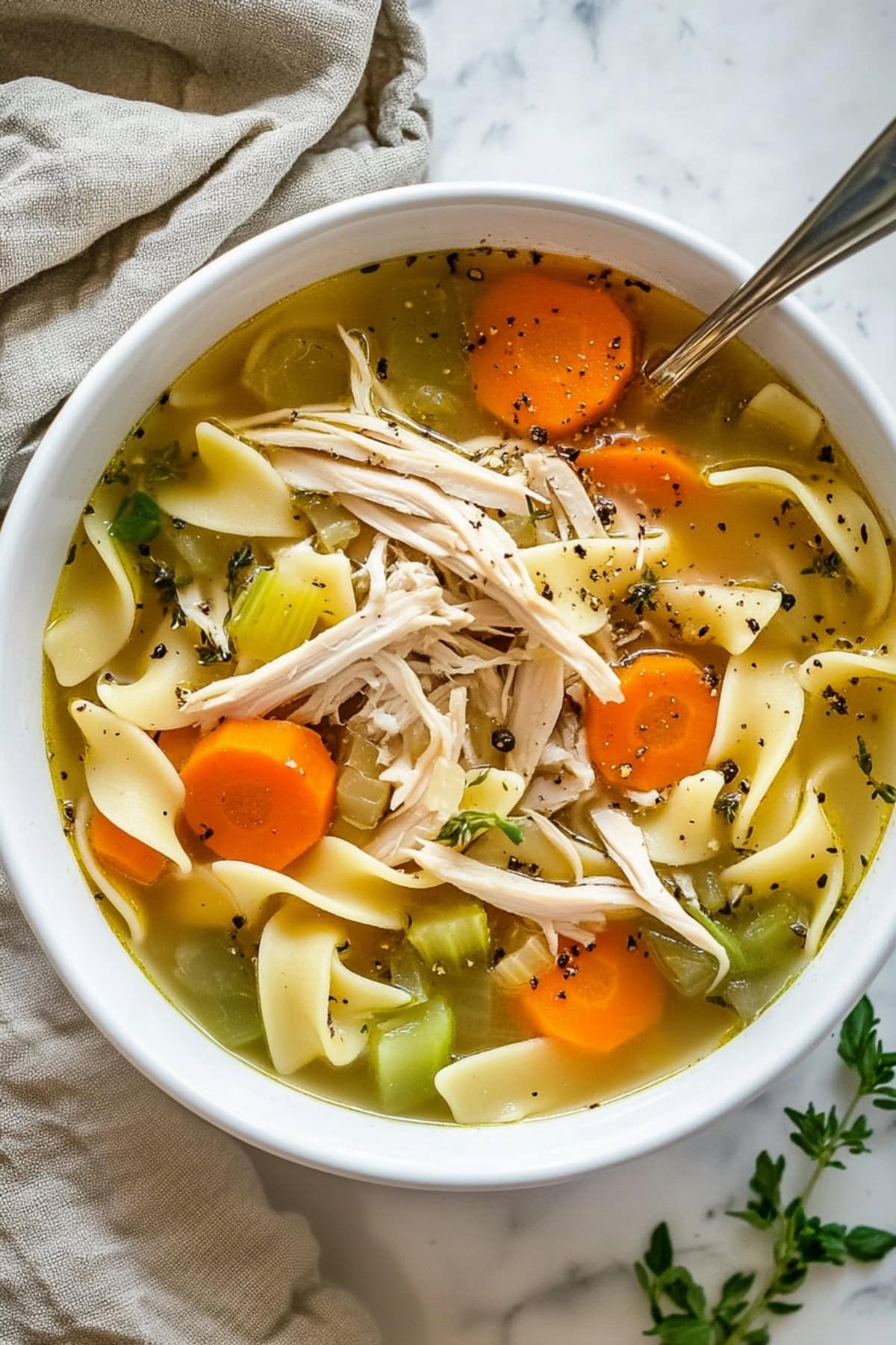 Savory homemade turkey noodle soup in a bowl.