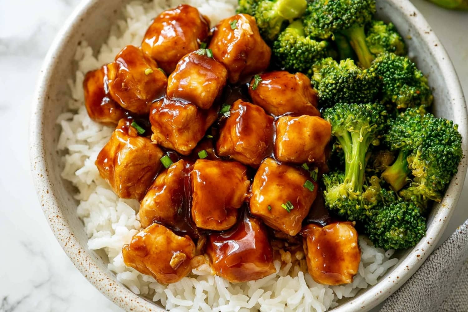 Apricot Chicken served with white rice and broccoli