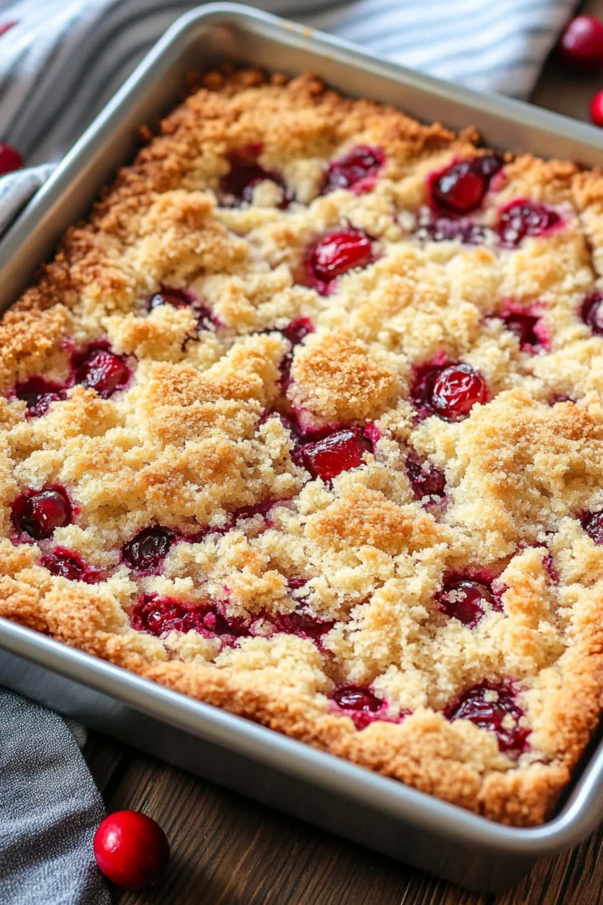 Baking dish with cranberry coffee cake, close up, top view