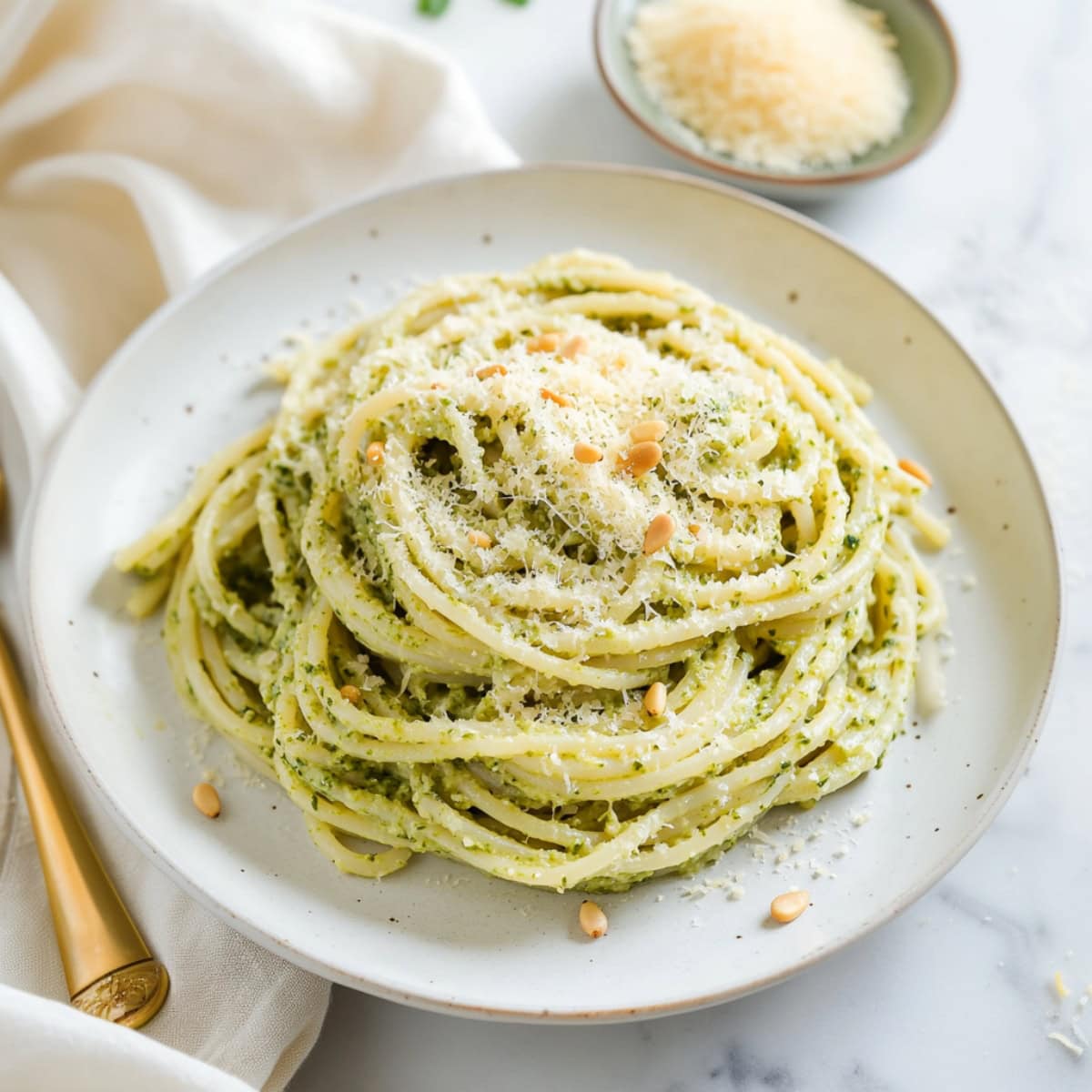 A plate of creamy lemon pesto pasta.