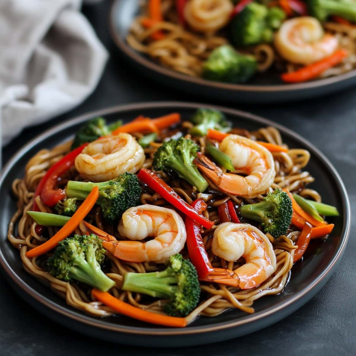 Stir fried shrimp in hoisin and soy sauce with carrots, bell peppers and broccoli.