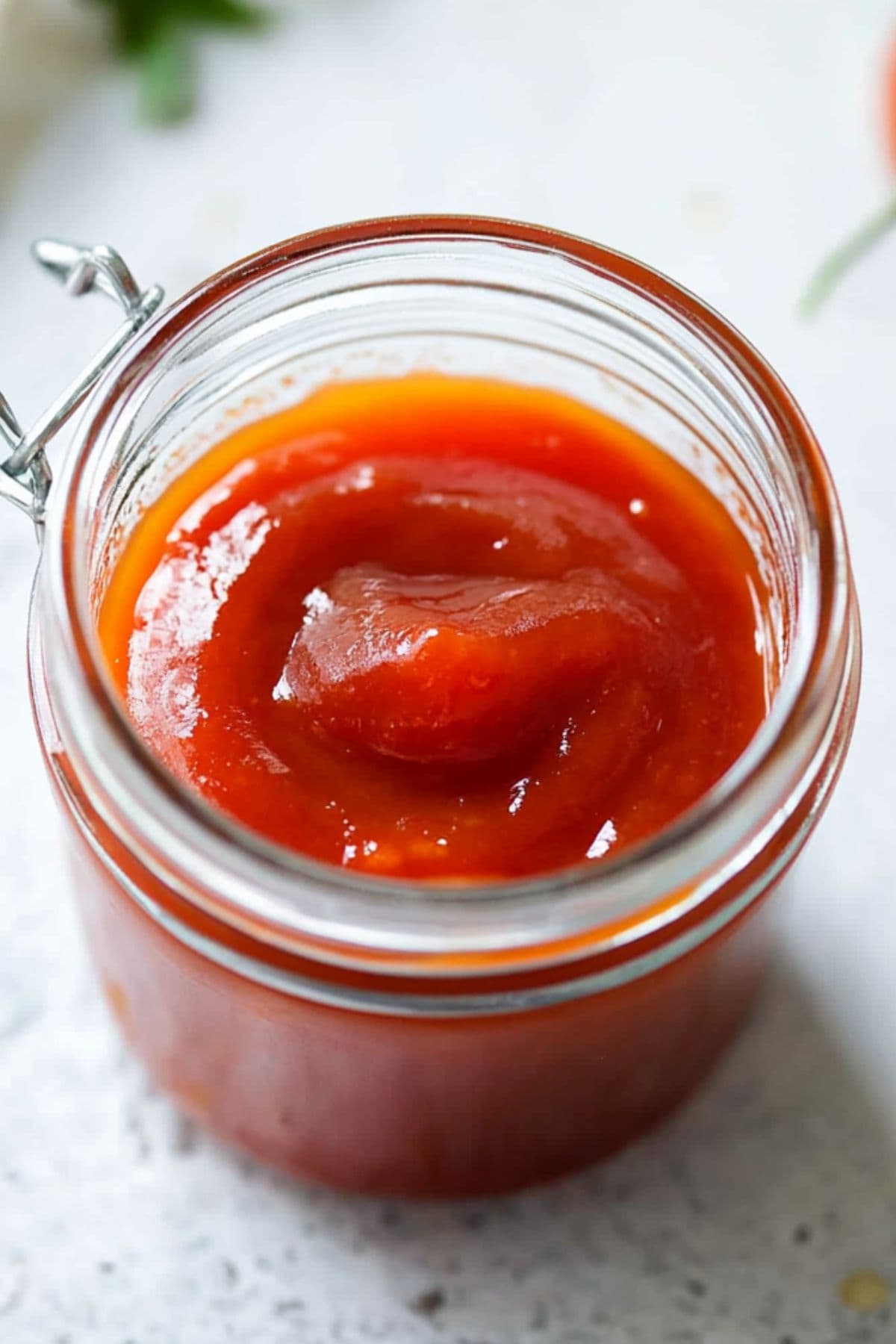 Homemade Arby's Red Ranch sauce in a small jar.