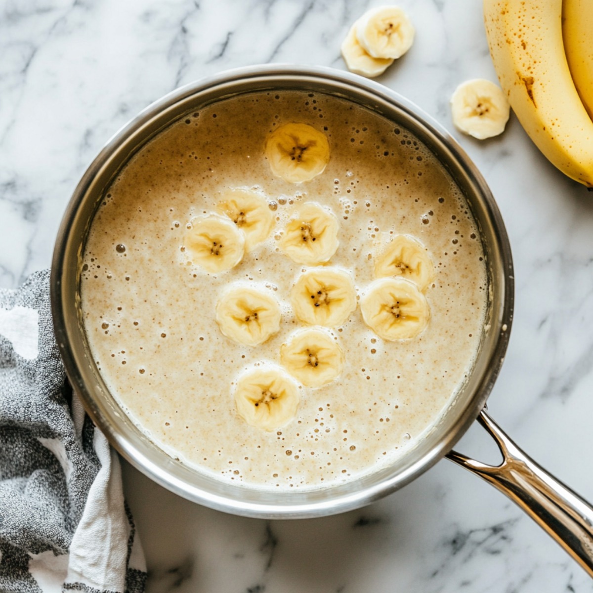 Banana Infused Milk in a Saucepan, top view