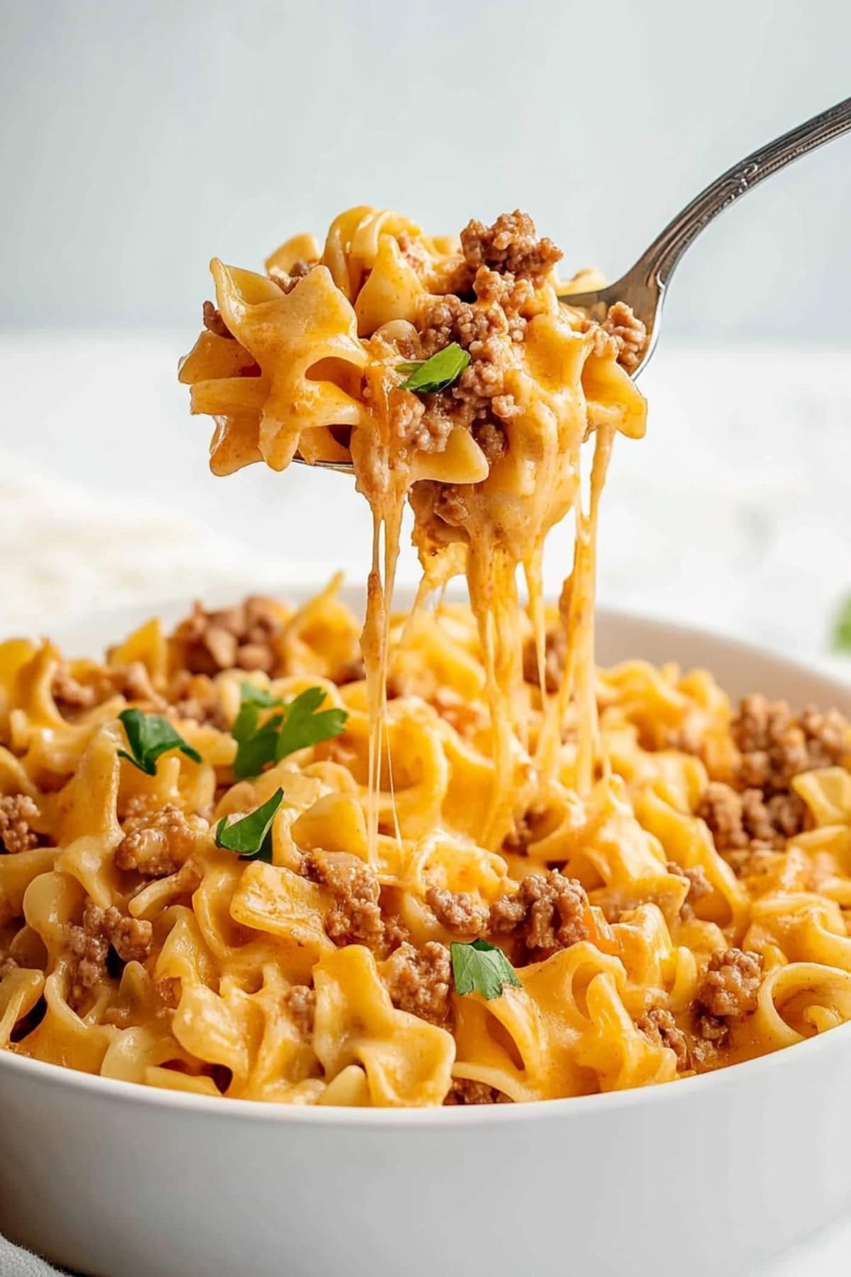 A comforting beef noodle casserole with cheese, ready to be served.