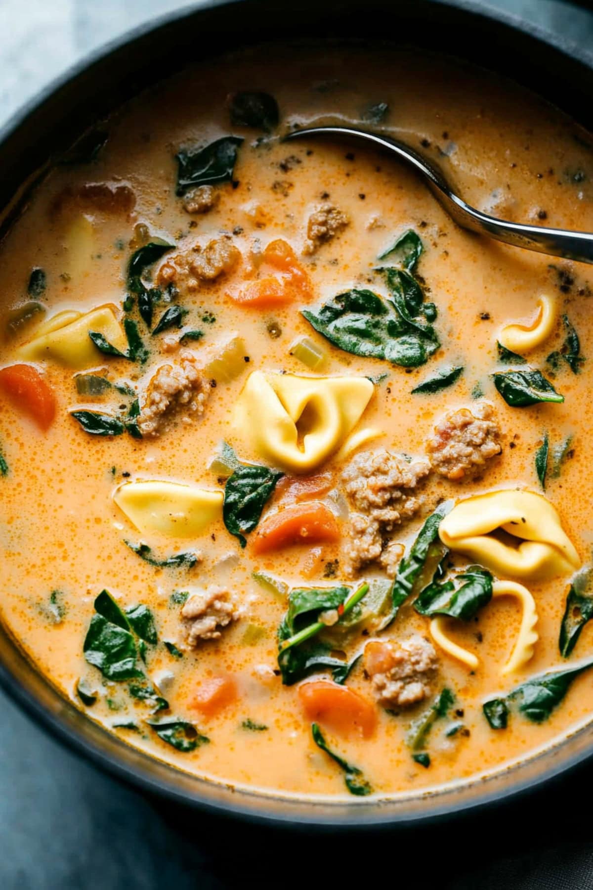 Creamy soup with ground sausage and tortellini