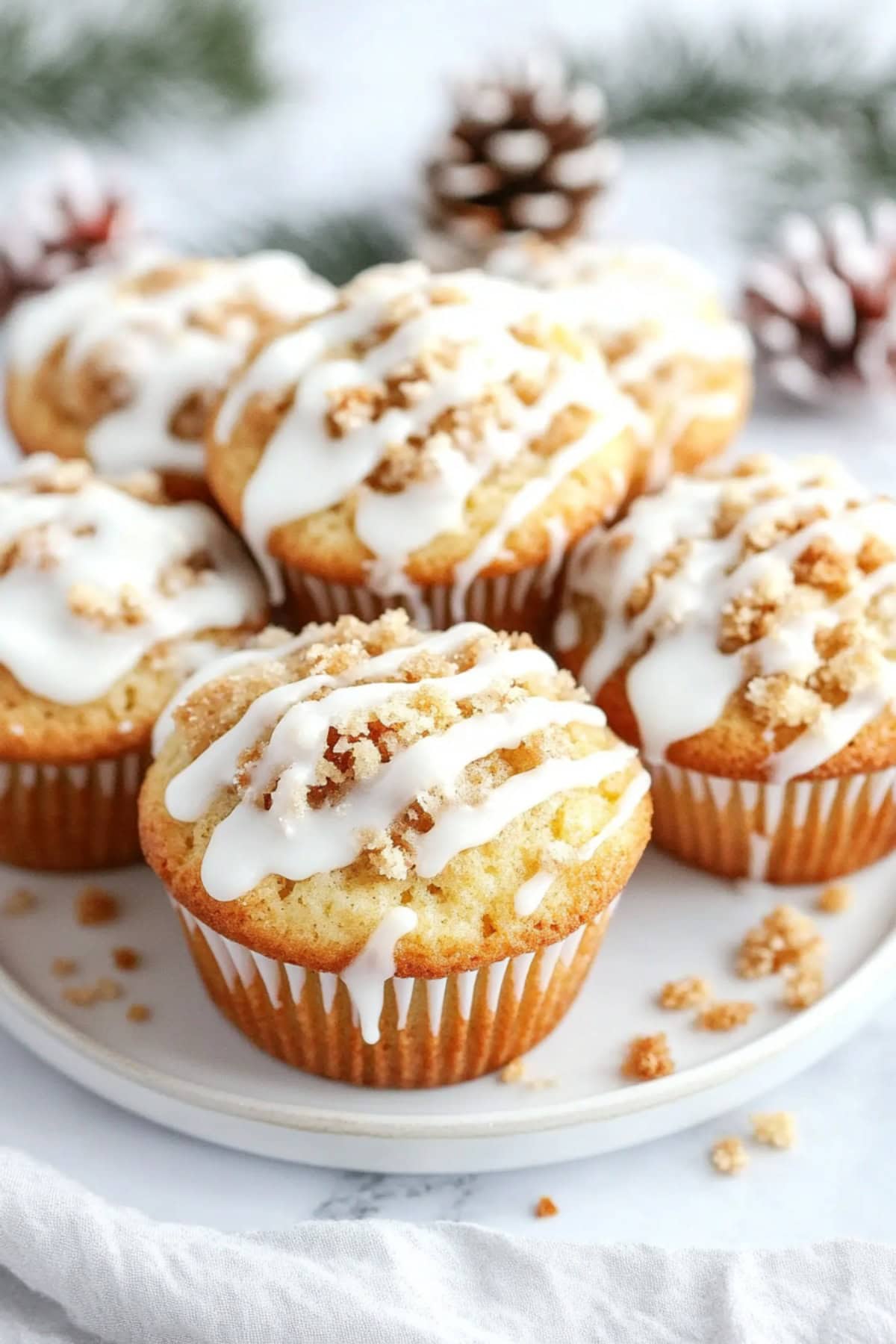 Eggnog Muffins with glaze, on a plate