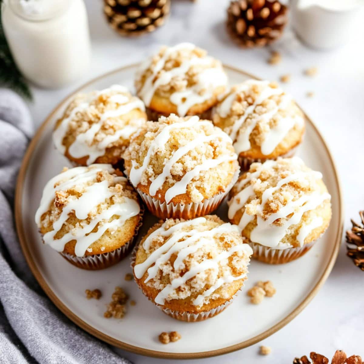 Eggnog Muffins with Streusel and Sweet Glaze on a Plate, top view