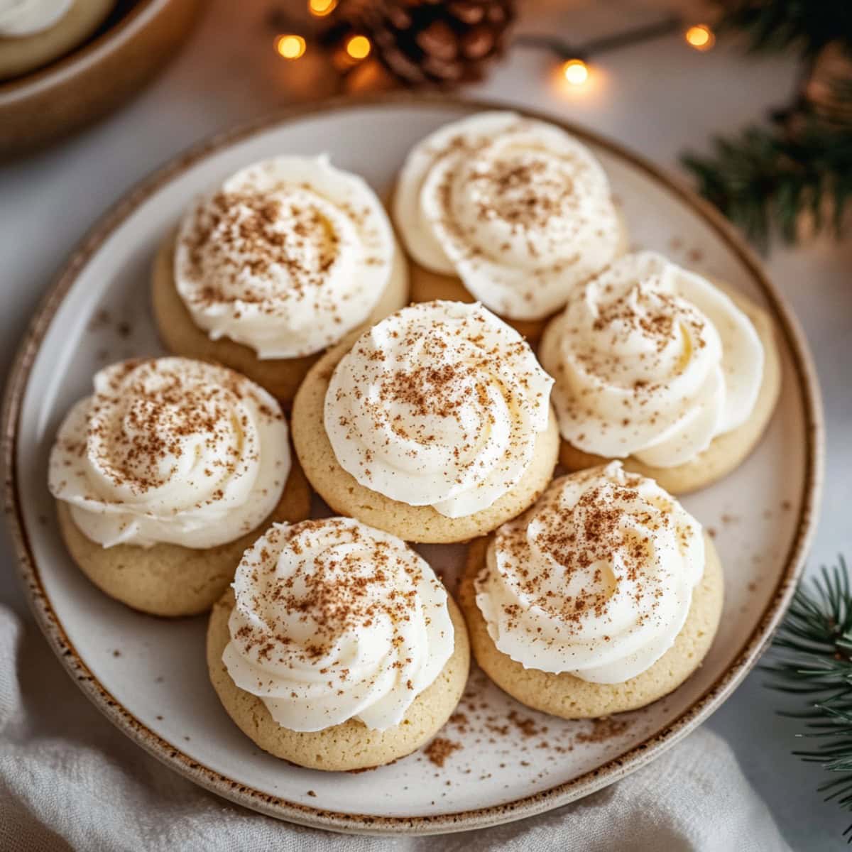 Frosted Eggnog Sugar Cookies on a plate