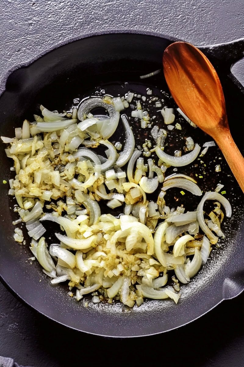 Sauteed onions and Garlic in a skillet.