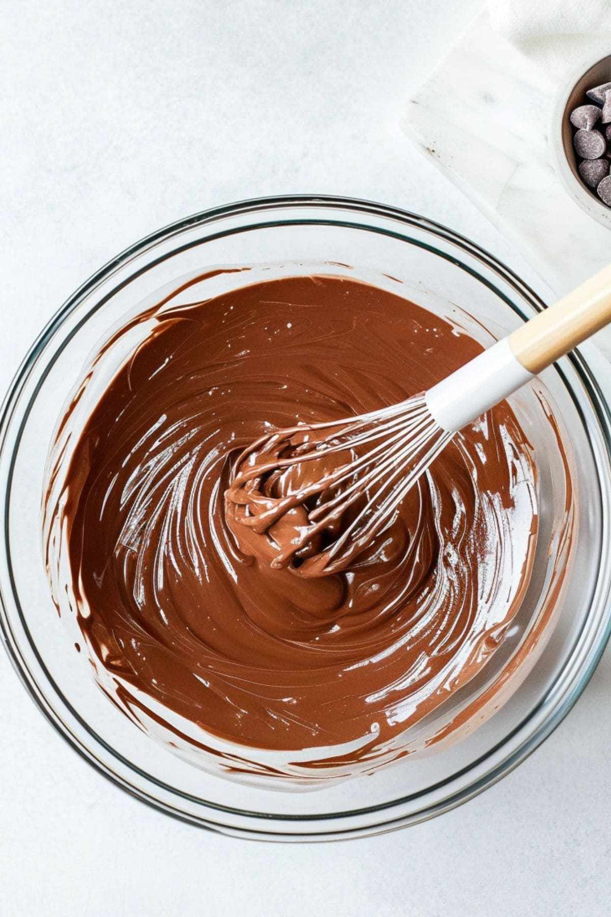 Nutella in a glass mixing bowl, top view