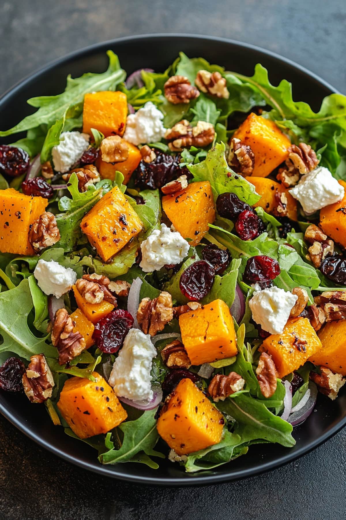 A bowl of Roasted Butternut Squash Salad, top view