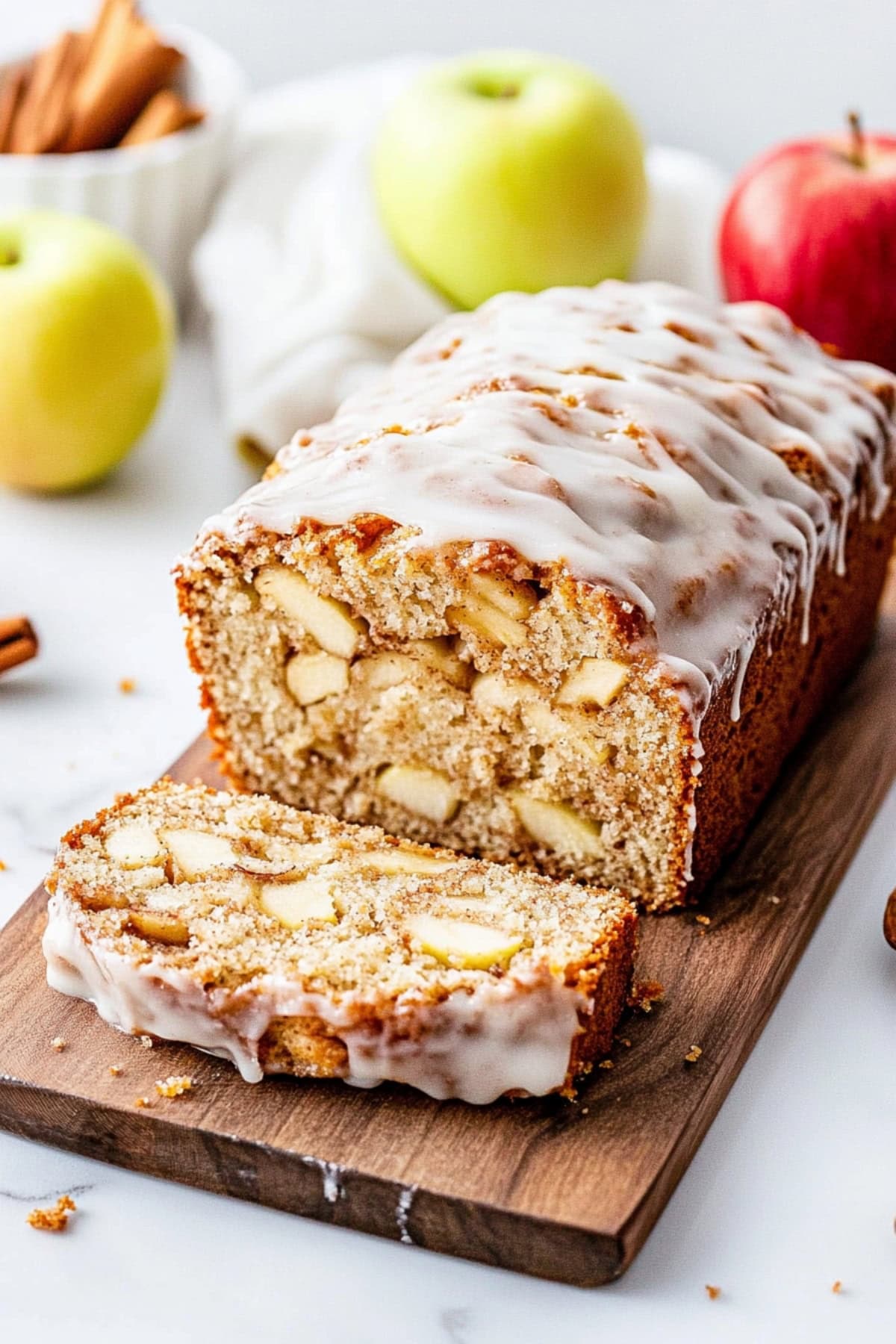 Amish Apple Fritter Bread Sliced on a Cutting Board