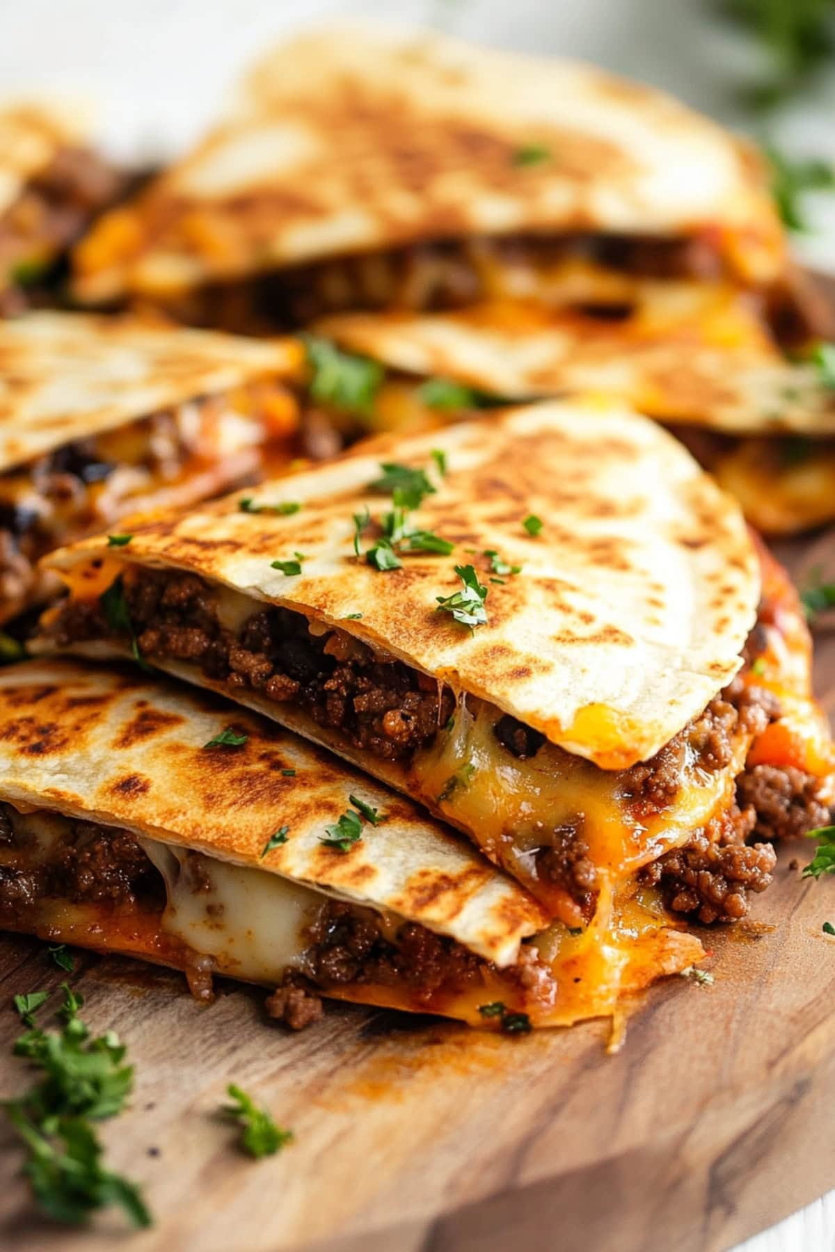 Chopping Board Full of Ground Beef Quesadillas