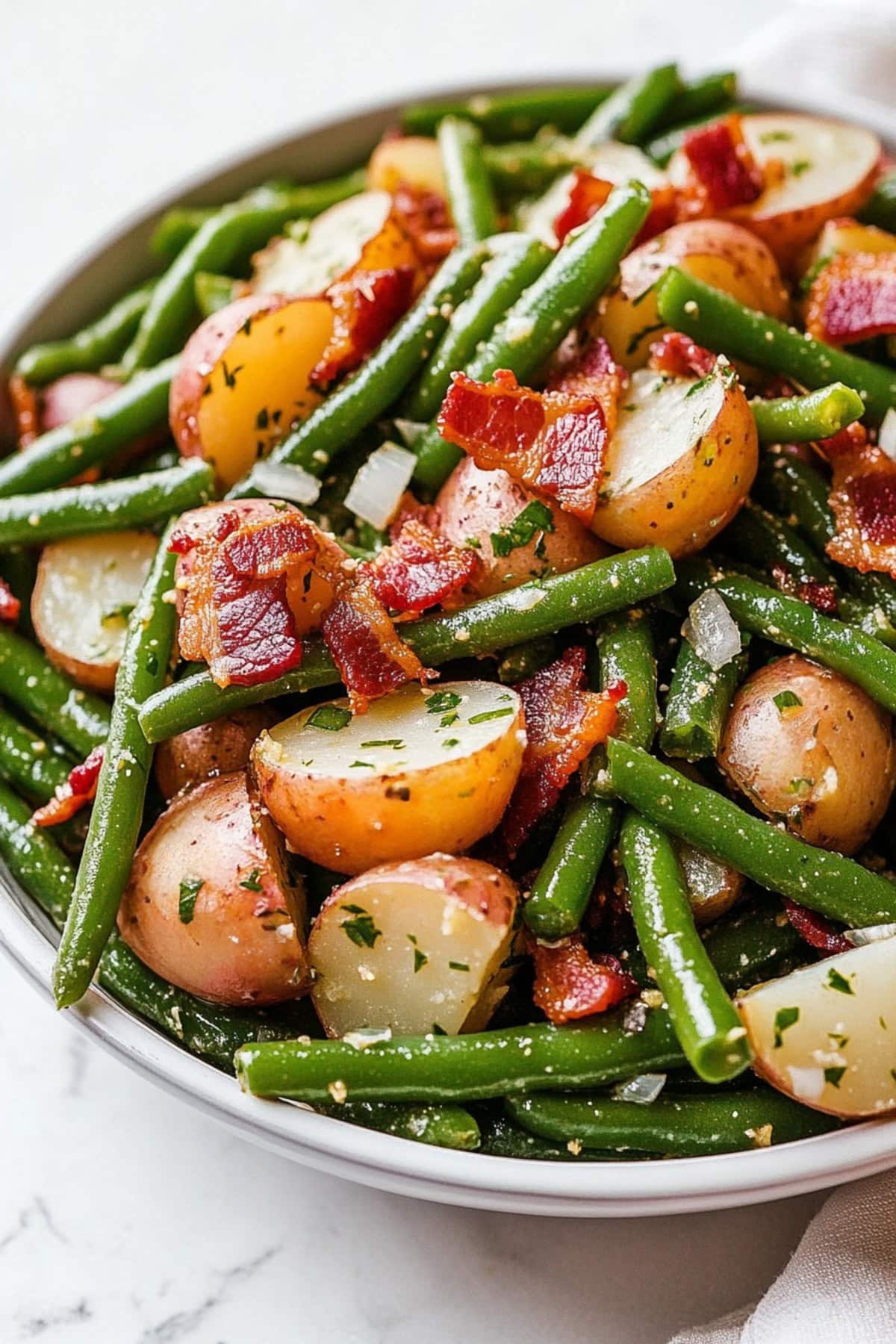 Homemade Country Ranch green beans and potatoes with bacon and onions.