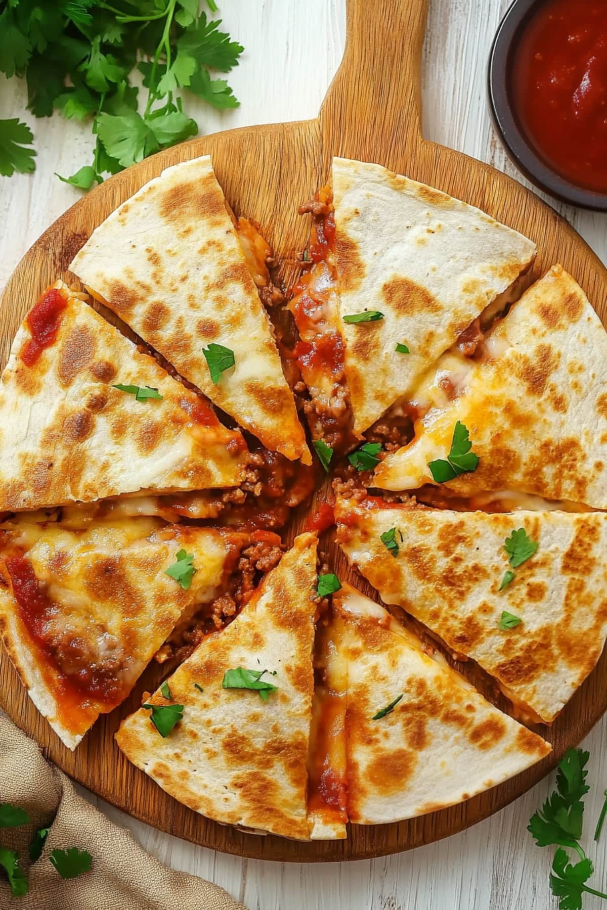 Ground Beef Quesadillas Cut on a Chopping Board, top view