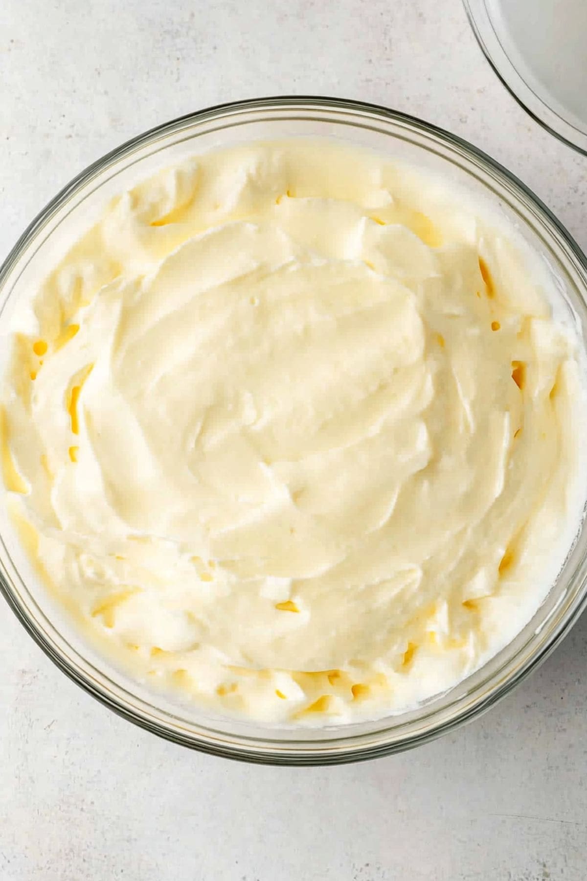 Creamy and thick pudding in a glass bowl.