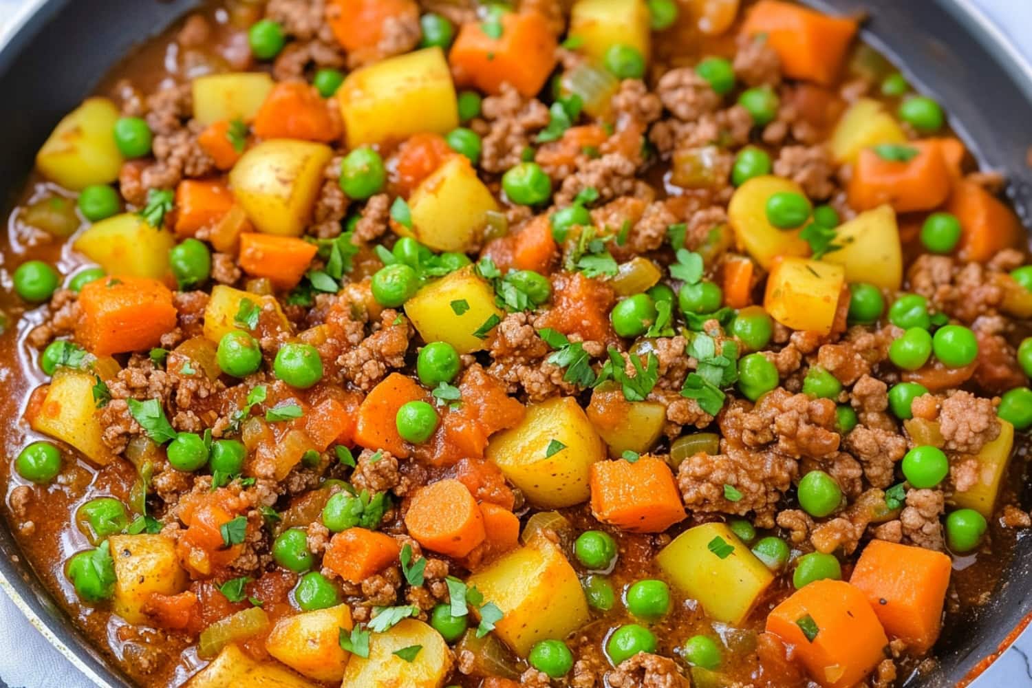 Mexican picadillo cooked in a pan.