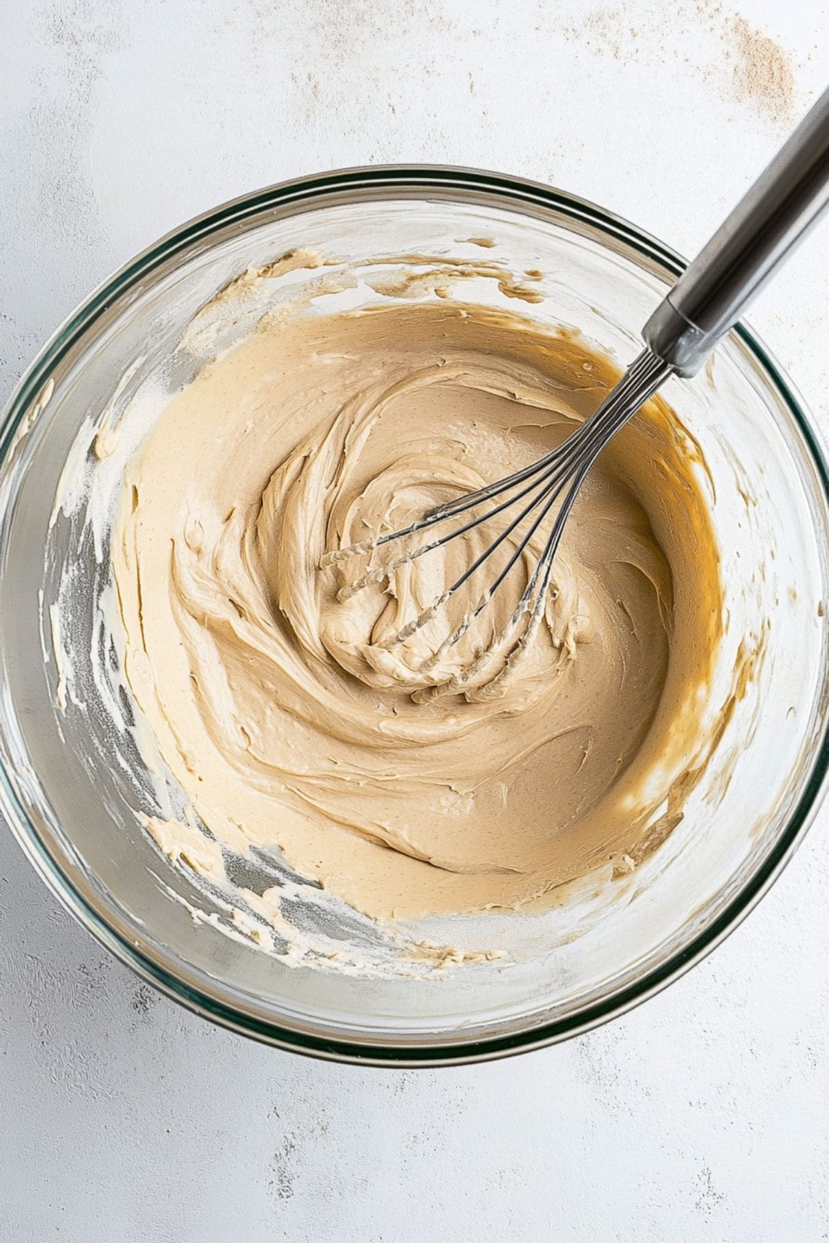 Peanut butter cream cheese in a glass bowl.