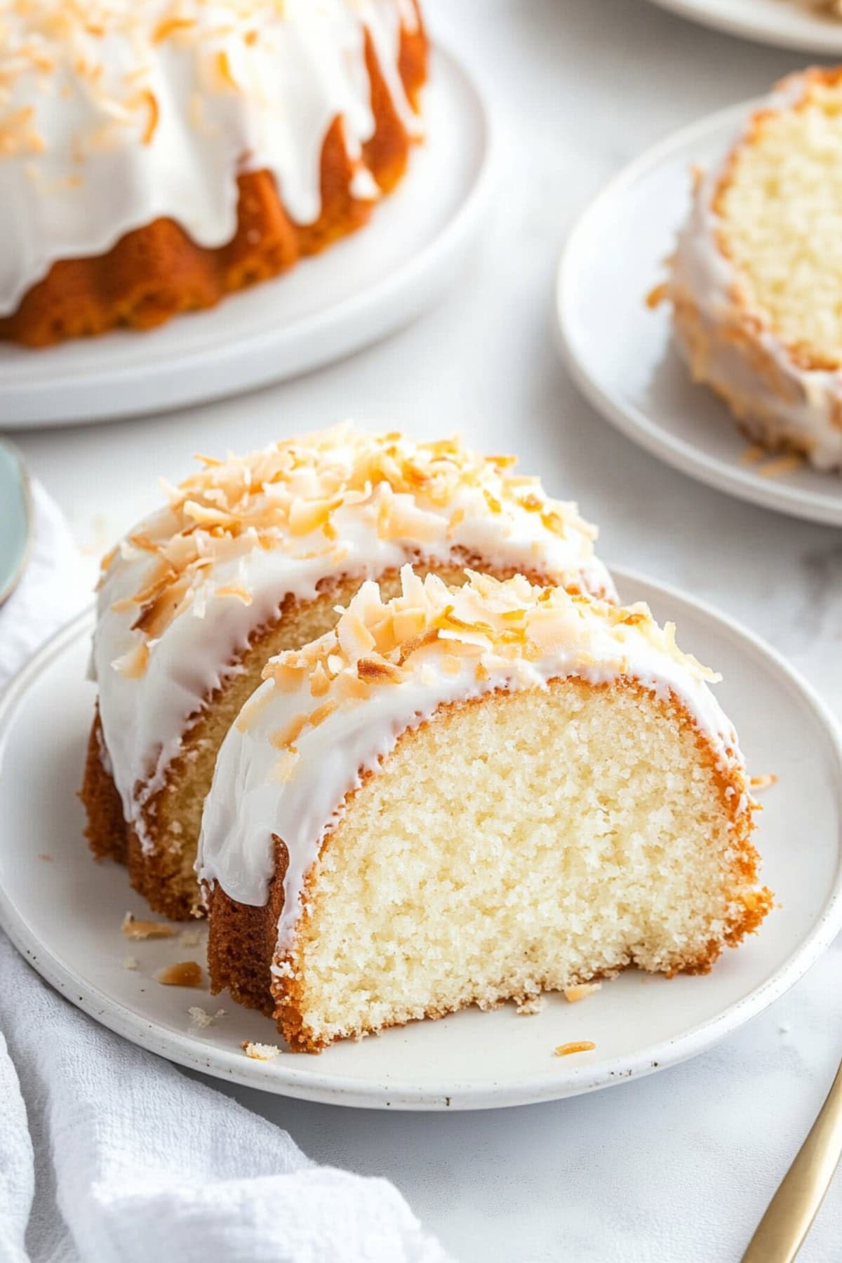 Slices of Pina Colada Pound Cake on a Plate