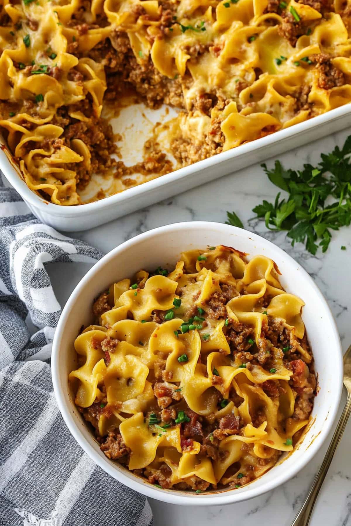 Sour cream noodle bake in a bowl and baking dish.