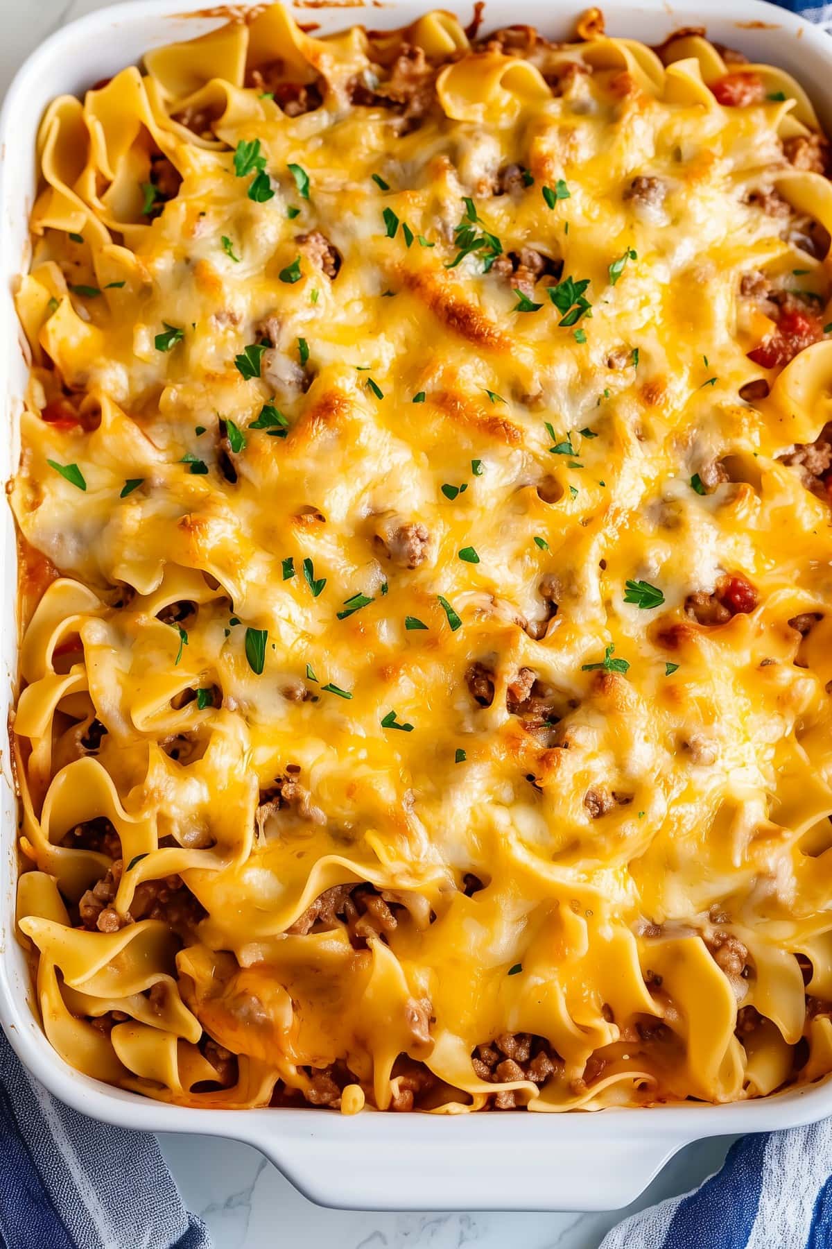 An overhead view of 9x13 baking dish of sour cream noodle bake.