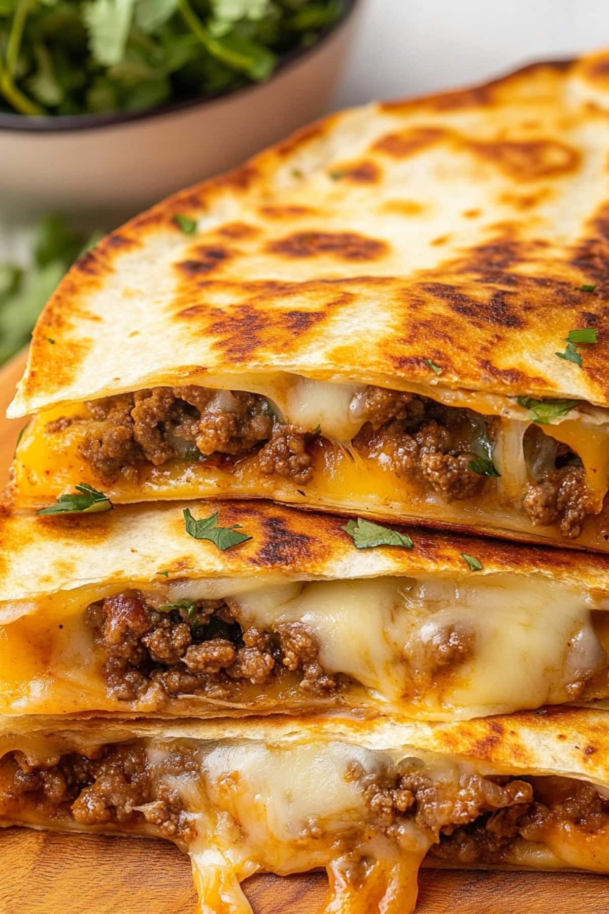 Stack of Ground Beef Quesadillas with Melty Cheese, close up