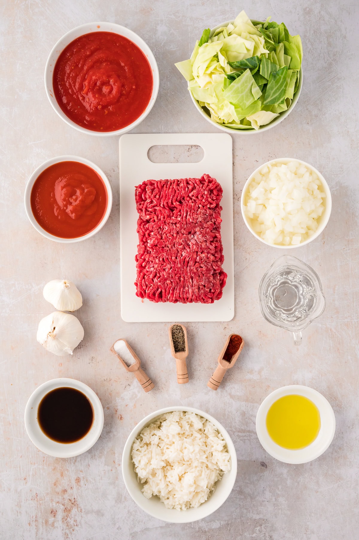 Unstuffed Cabbage Rolls Ingredients - ground beef, tomato sauce, crushed tomatoes, cabbage, onion, rice, Worcestershire sauce, garlic, spices 