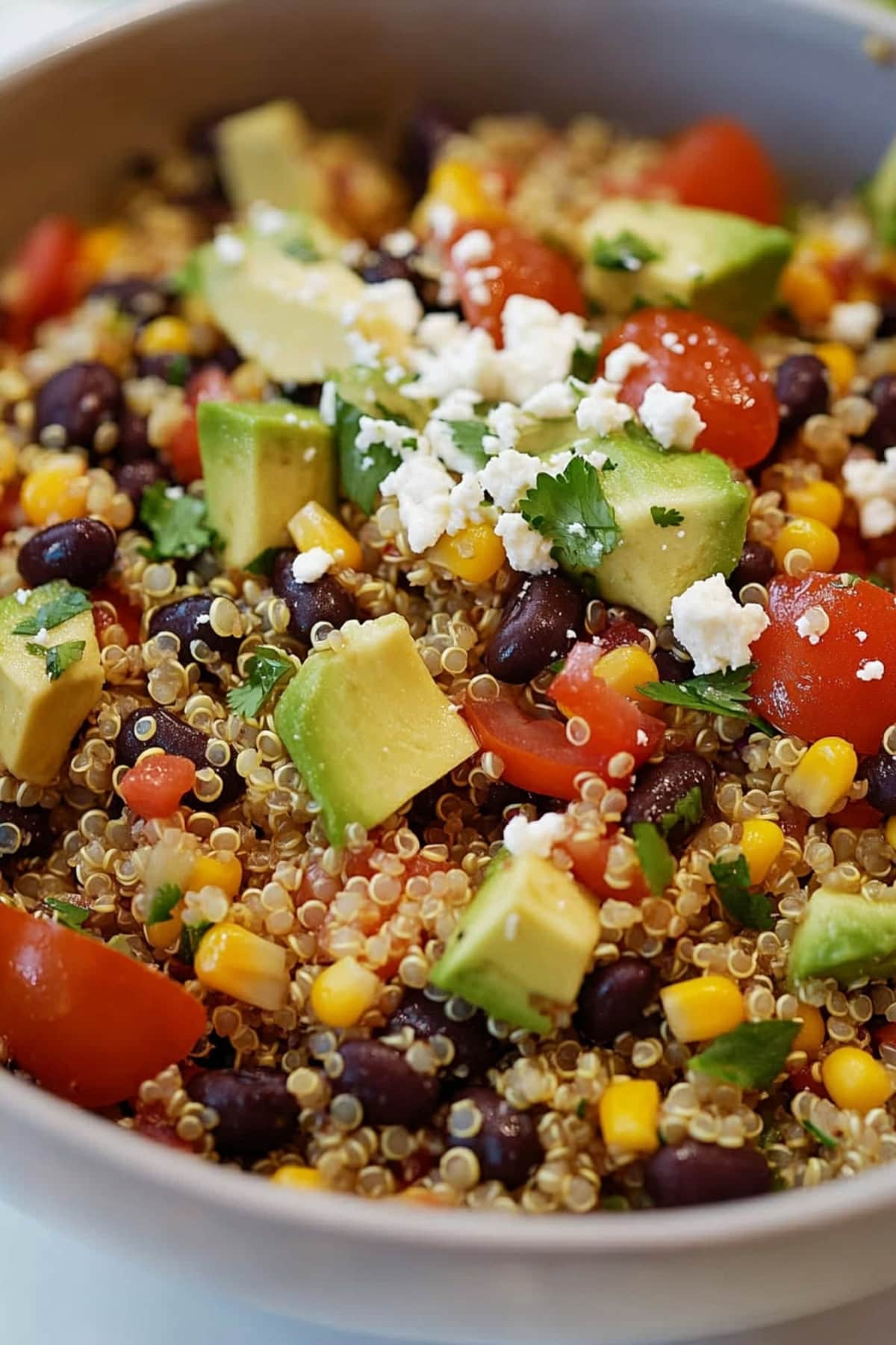 Southwest quinoa salad with avocados, corn and fresh veggies.