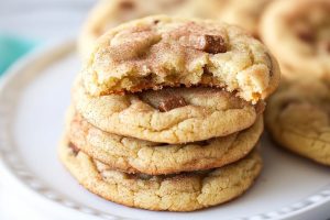 Freshly baked toffee cookies with a crispy edge, soft center, and a scattering of toffee bits on top.