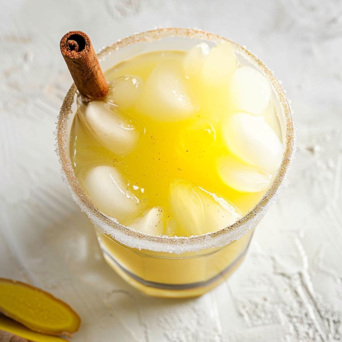 Iced cold gingerbread mocktail with orange juice, apple cider, and ginger beer. 