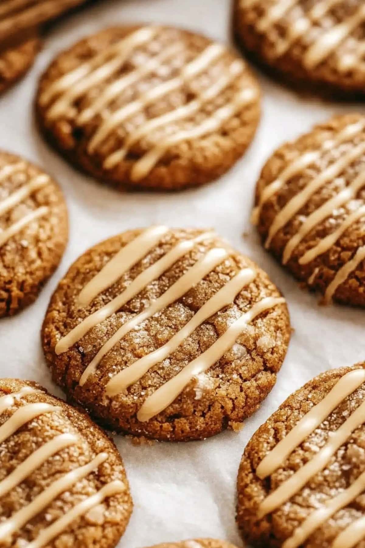 Gingerbread Latte Cookies with Sweet Glaze on Parchment Paper