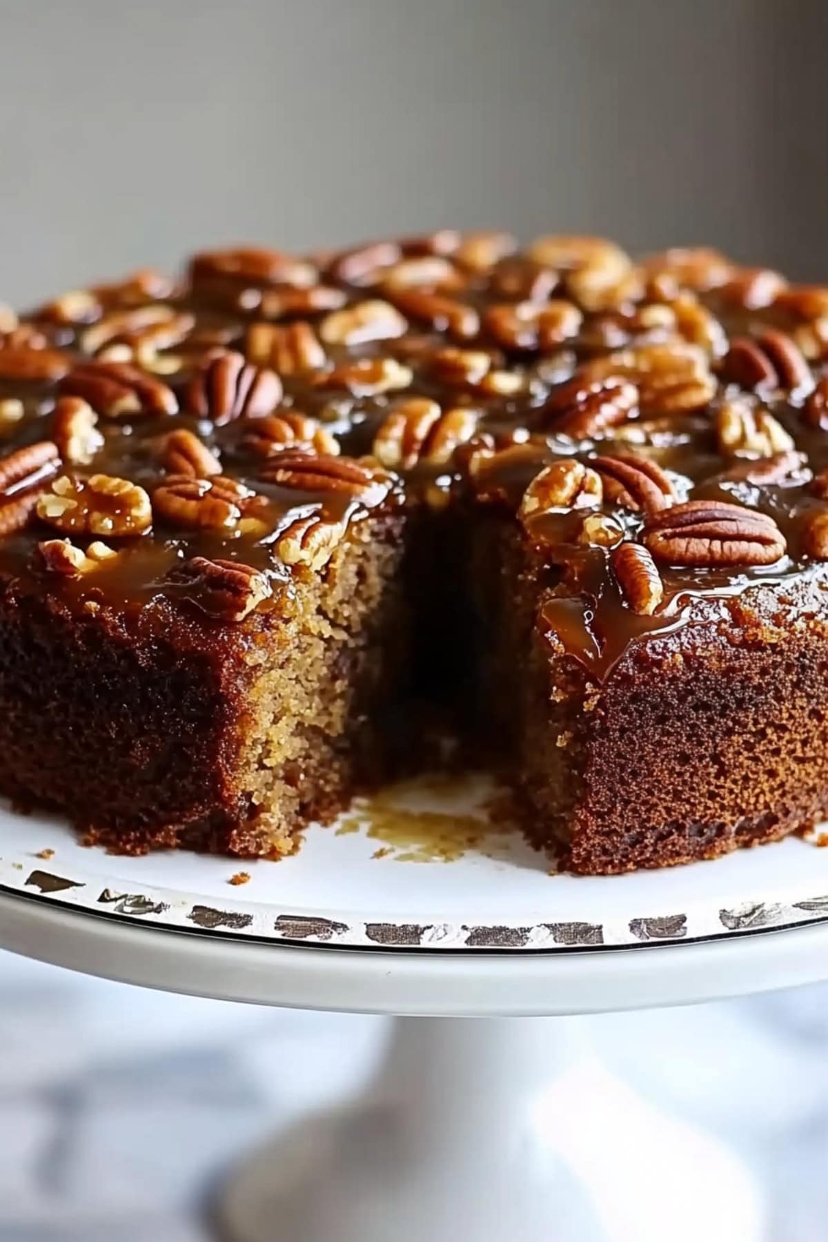 Pecan Upside Down Cake on a Cake Stand