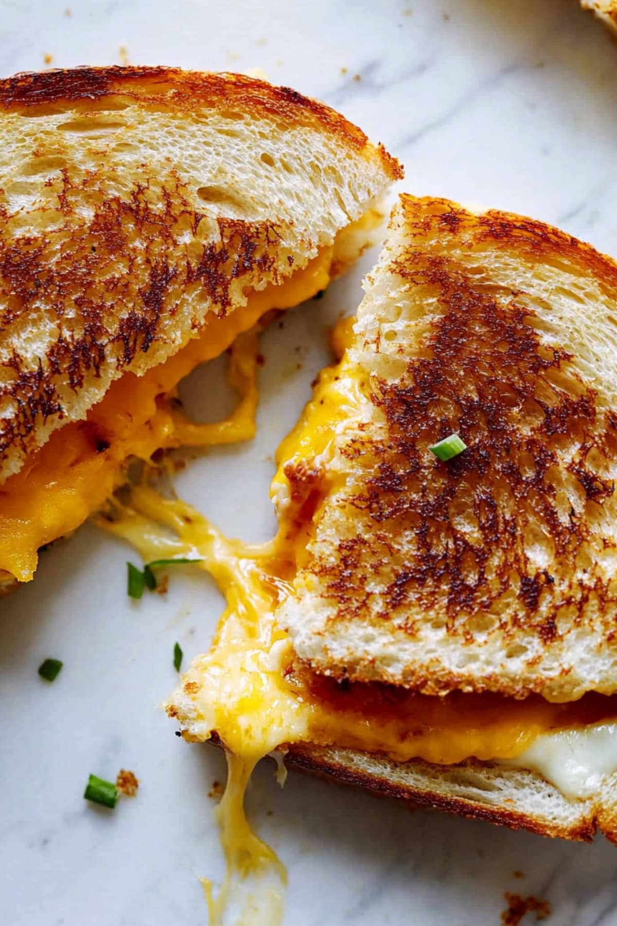 Top view of breakfast grilled cheese cut in half