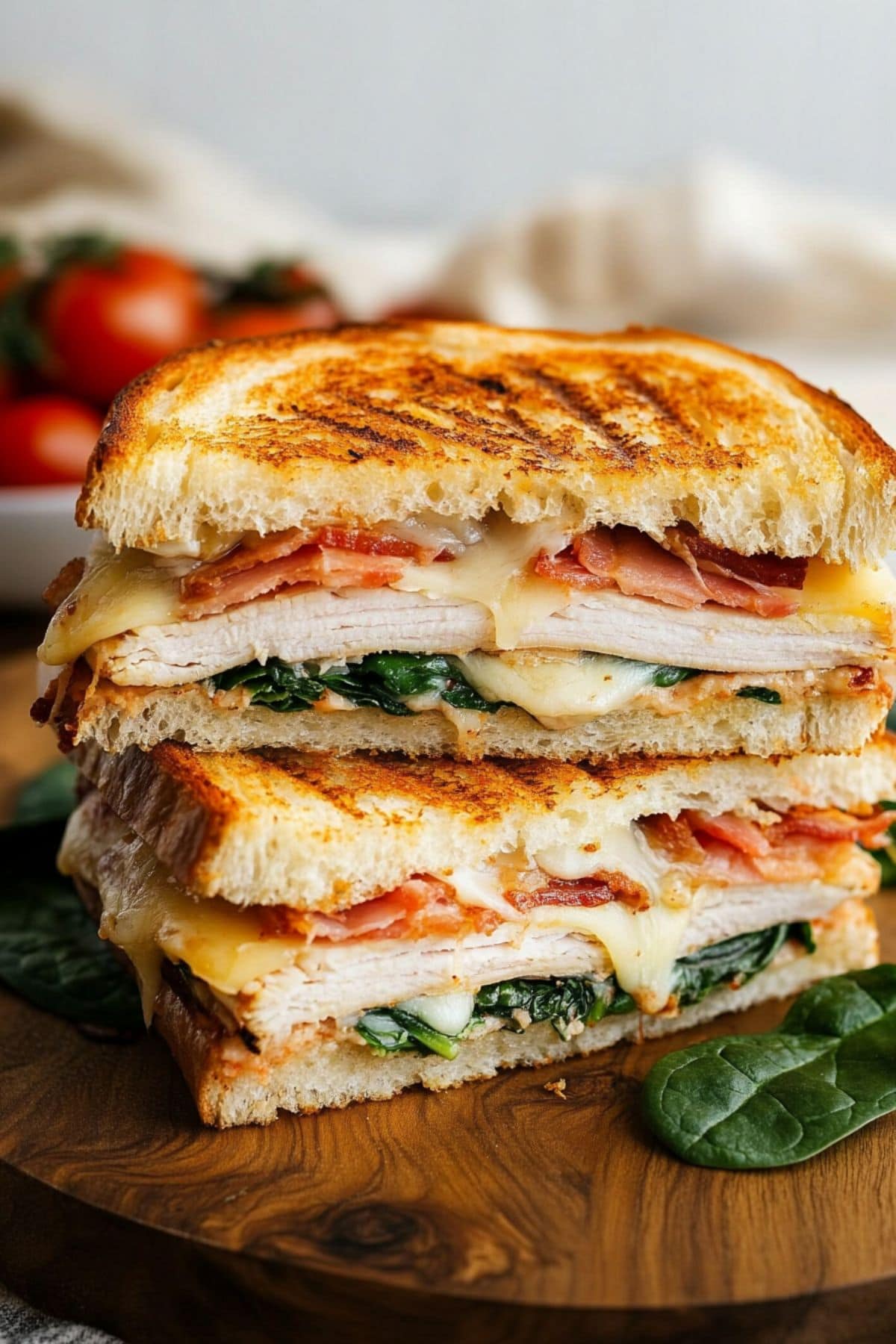 Grilled cheese with turkey, bacon, tomatoes, and spinach