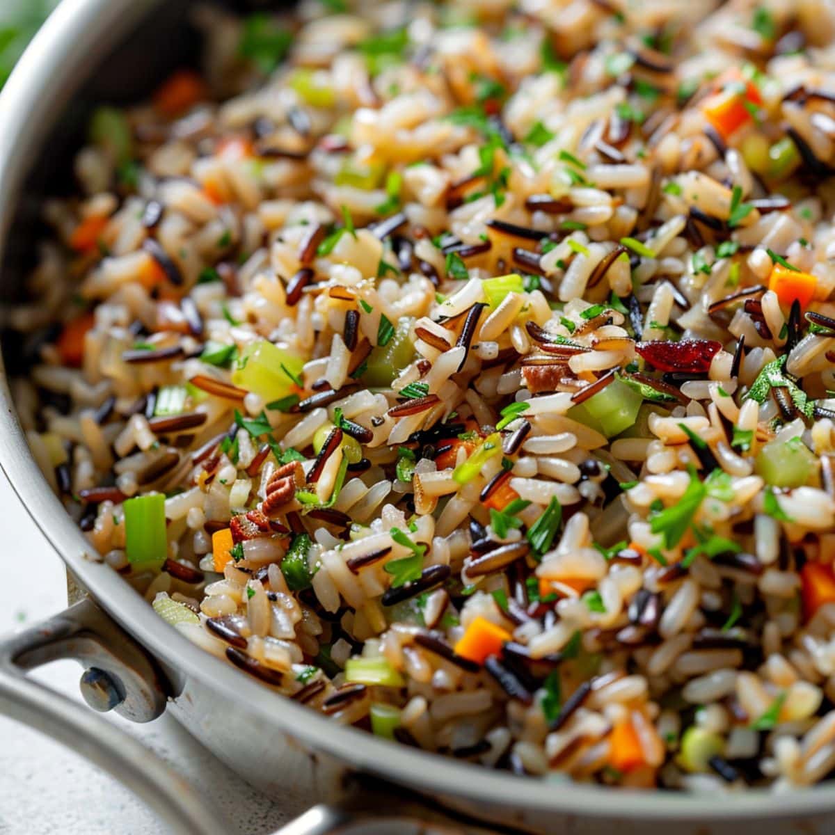 Wild rice pilaf cooked in a sauce pan.