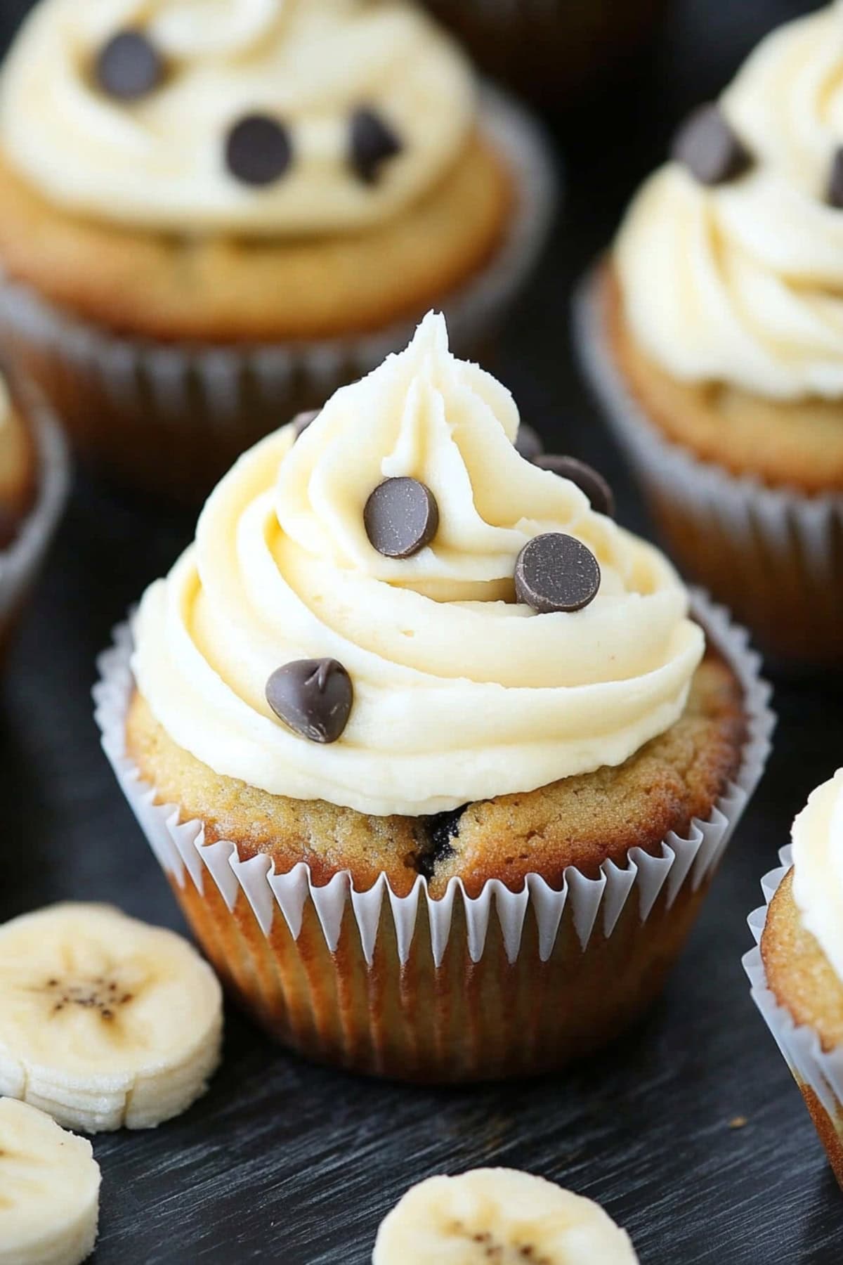 Banana cupcakes with creamy frosting and chocolate chips